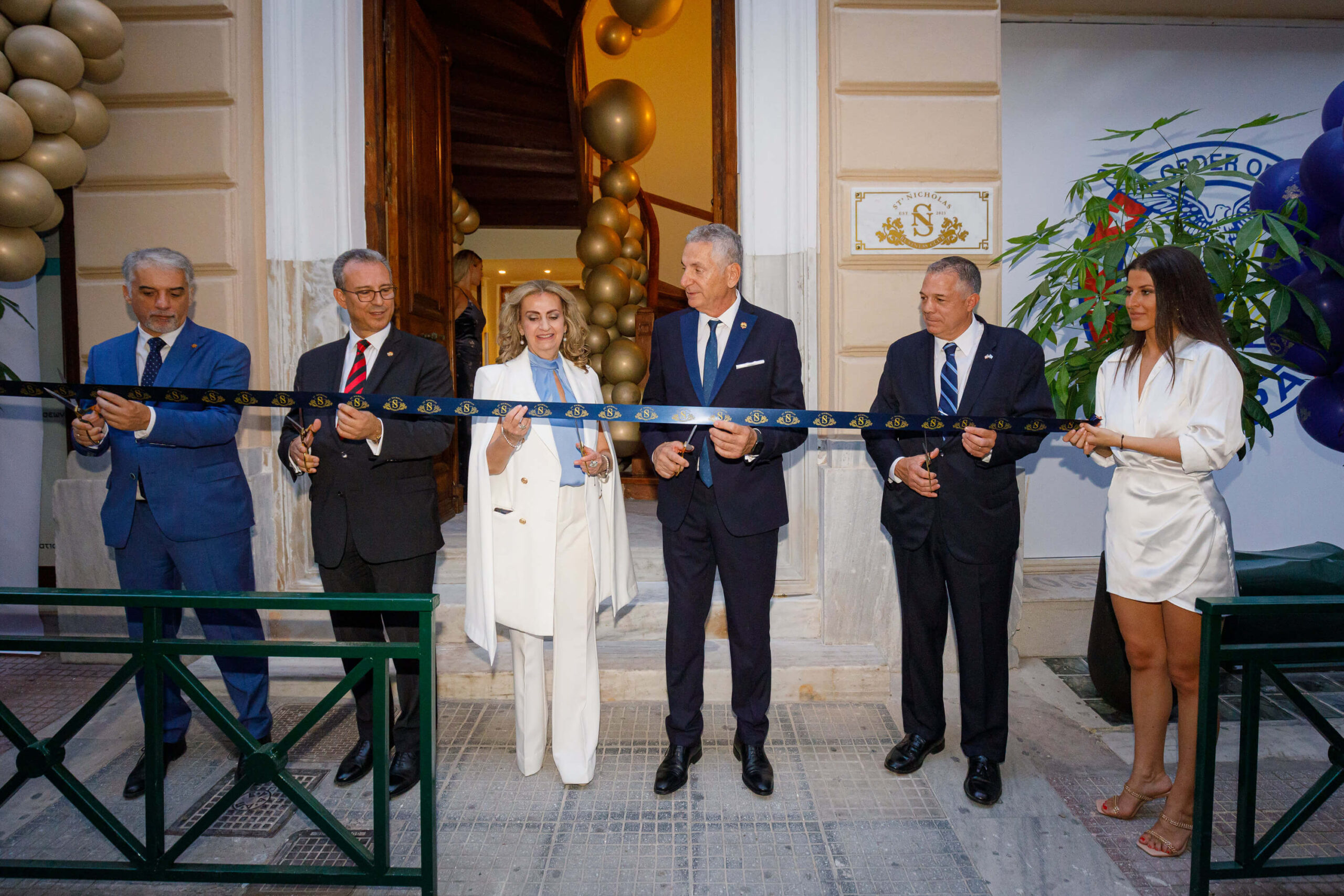 Board members cutting the ribbon